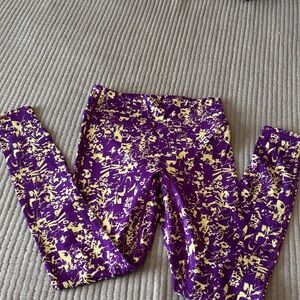 Fabletics Motion365 purple and yellow leggings